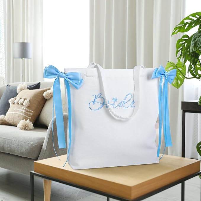 WUBOECE Bride Canvas Tote Bag White Blue Satin Bows Bachelorette Party Decorations Bride to Be Purse Accessory Bridesmaid Gift Bridal Shower Gifts Engagement Party Accessories