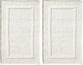 mDesign 100% Cotton Bath Mat - Soft Hotel-Style Rectangular Bathroom Floor Rug - Plush, Water Absorbent Cloth Bathmat for Outside Bathtub/Shower, Machine Washable Cotton Bath Rug, 2 Pack, Natural/Tan